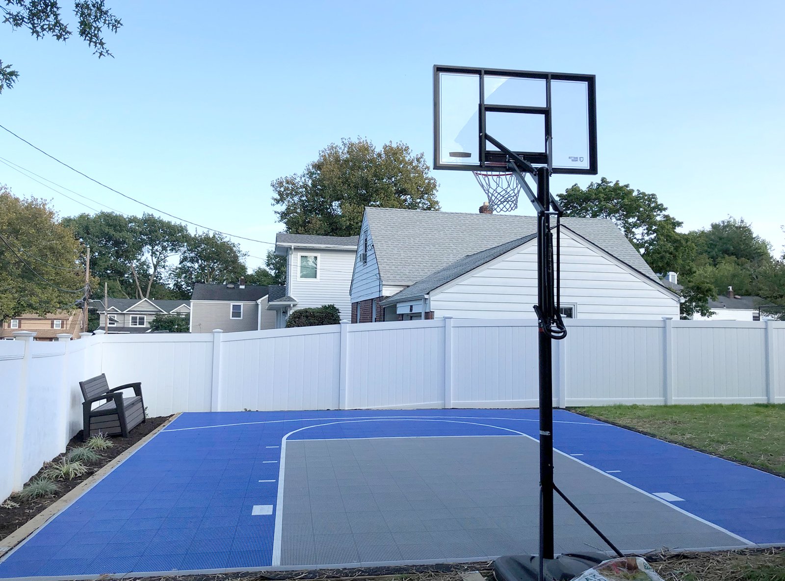 Electric — Basketball half-court · bright blue & grey